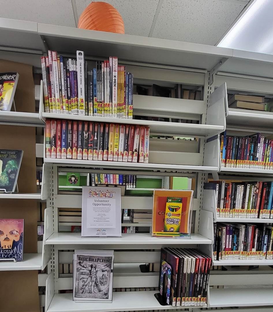 Teen space showing materials on a shelf